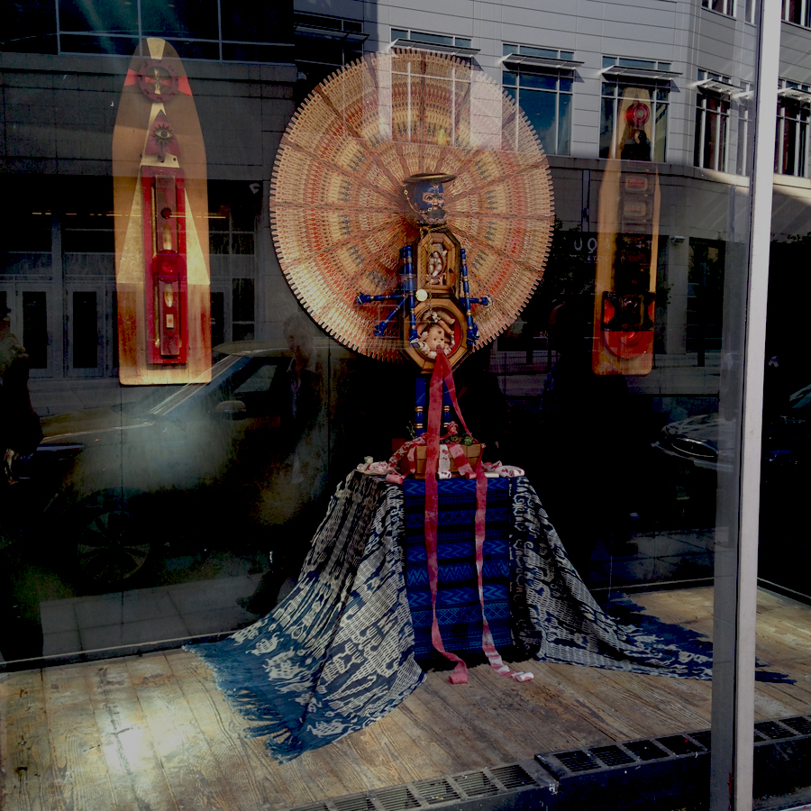 Department store window display installed in Toledo, Ohio in an empty midcentury department store for Gallery Project\'s \"Wish List\". \"Demon of Destruction\", \"48\" Cigar Band Mandala\", 2 \"Visual Prayers \" mixed media August 2015