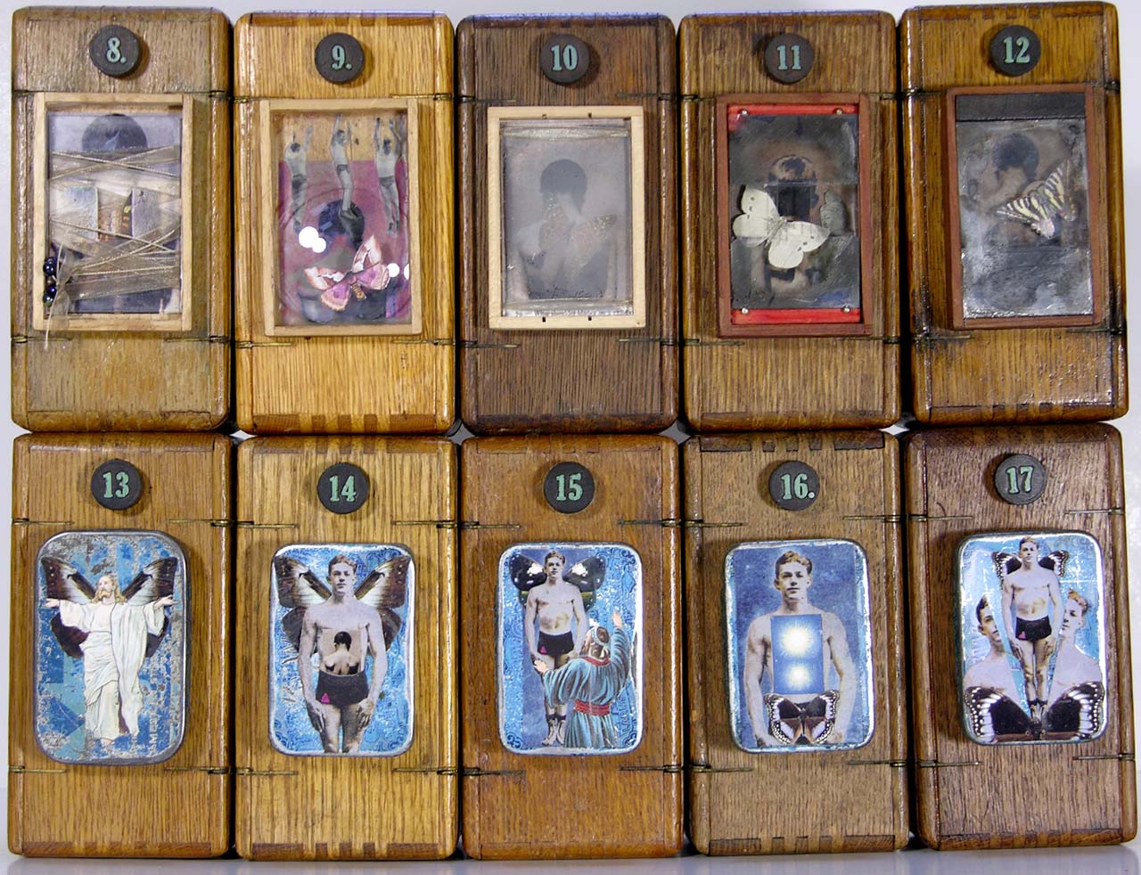     \"The Metamorphosis of Faith (exteriors)\"
    6.5\" x 3.5\" x 3.5\" (each box when closed)
    2005
    The fronts of 10 pieces from the series The Metamorphosis of Faith.